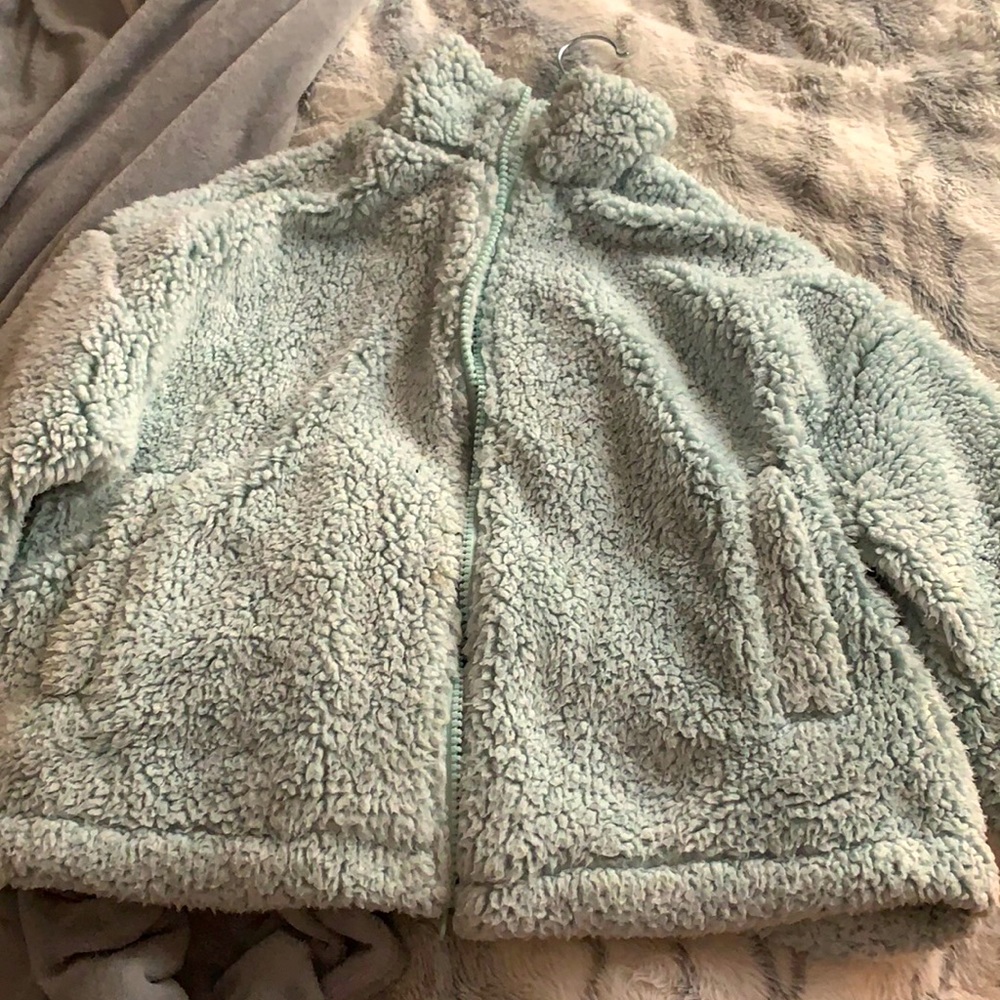 Fluffy blue cropped zip up